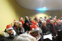 Carolsinging met T2muziek en Heelsums Gelegenheidskoor in muziektent