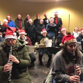 Carols zingen bij muziektent Heelsum